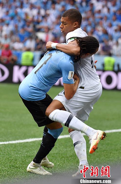 雷火电竞简介-乌拉圭碾压葡萄牙，格列兹曼刷新纪录